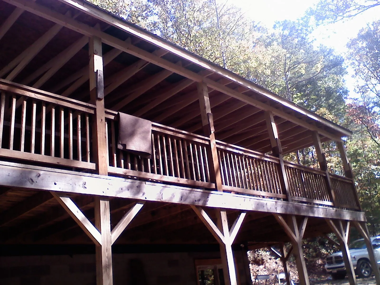 Timber framing under a new elevated porch and deck — Roof Leak Repair in Indiana by Roofing Brothers